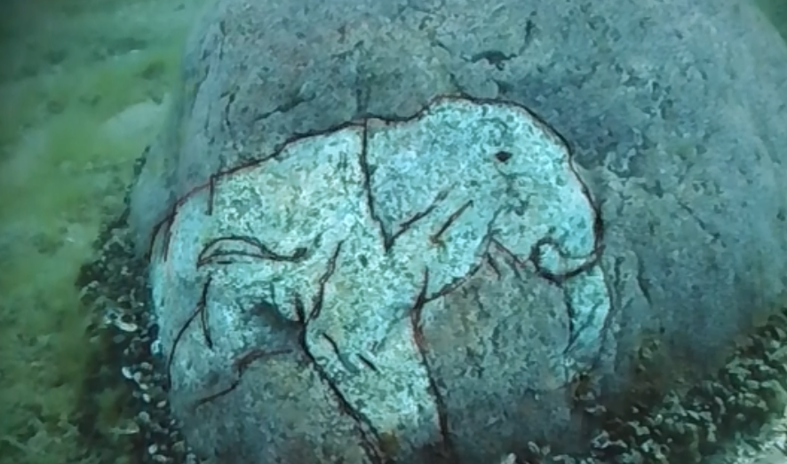 A boulder about three and a half to four feet high and five feet wide was found with a prehistoric carving of a mastodon etched into the stone. Both animals have been extinct for about 11,00 years.