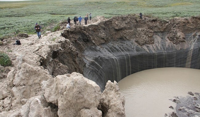 Mysterious craters in Siberia signal climate change’s impact on permafrost, releasing potent methane gases and raising alarm over warming feedback loops.