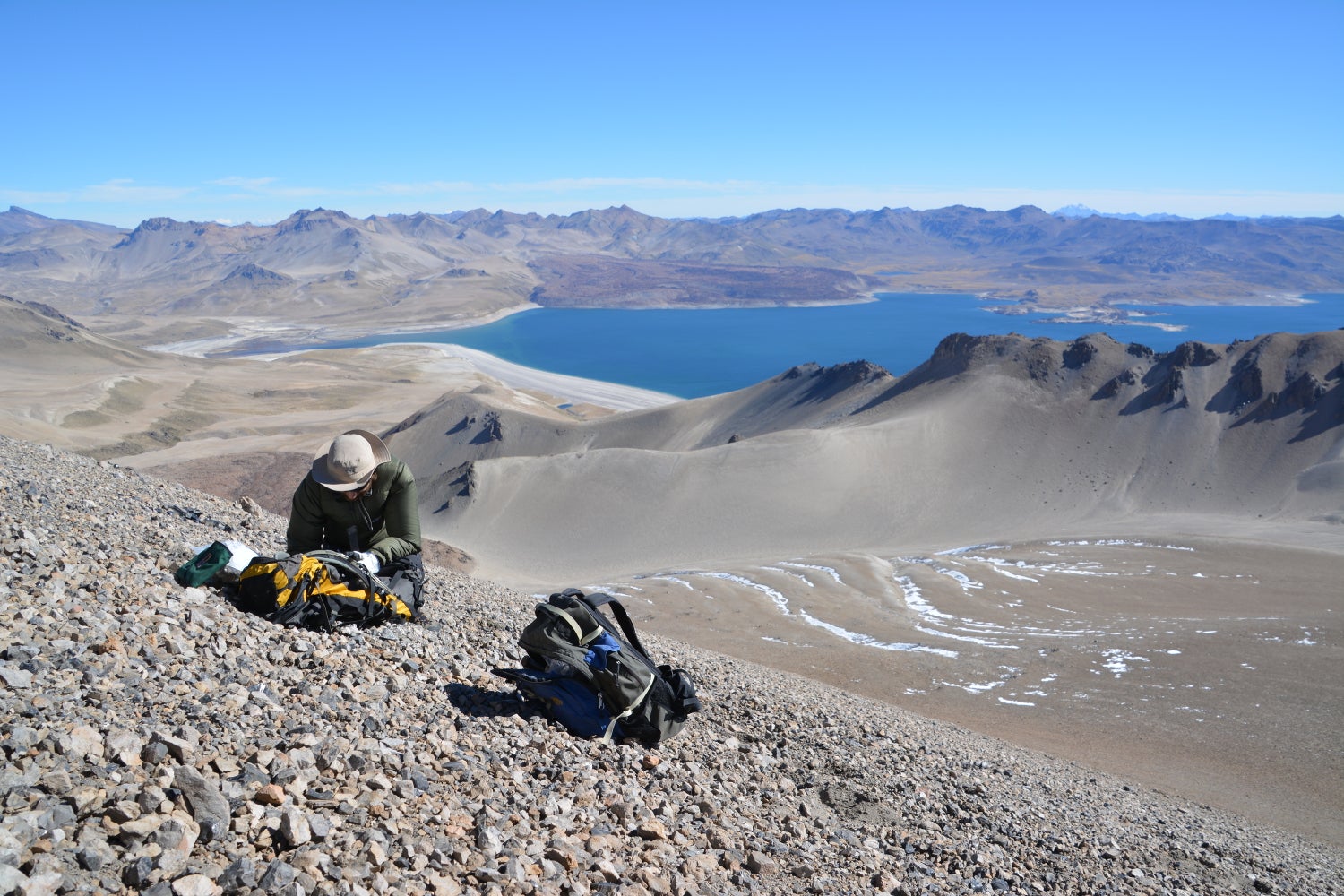 View southwest across Laguna del Maule, Chile, from near the summit of the vent for the Holocene rhyolite flows of Cari Launa at 3030 meters above sea level. 