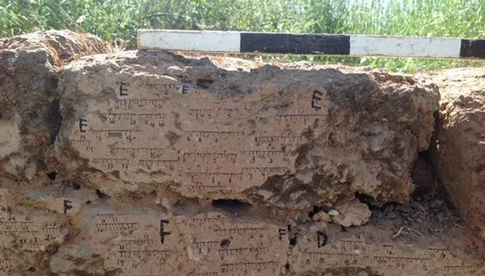 Burnt mud brick wall from Tel Batash (Biblical Timnah) with markings of the field orientation