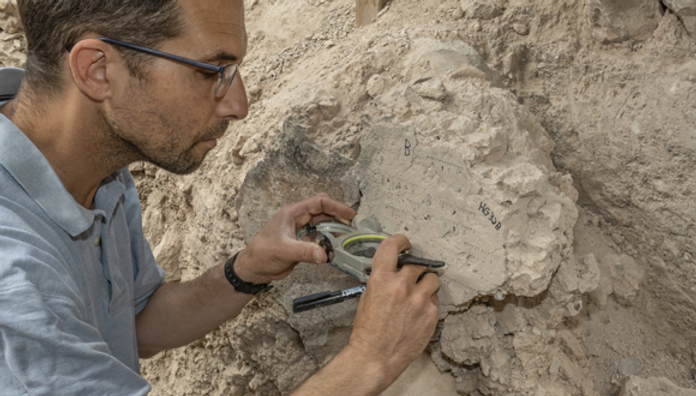 Yoav Vaknin measuring at the site. 