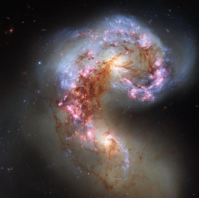 Two antennae galaxies colliding. 