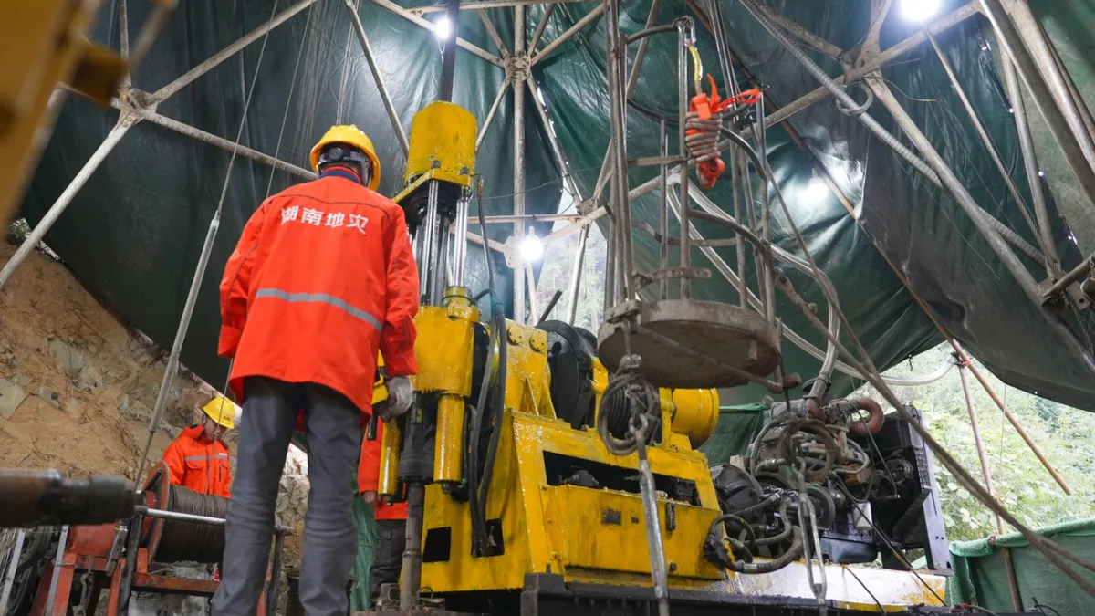 Geologists from the Hunan Geological Bureau identified over 40 veins of gold ore during initial explorations.